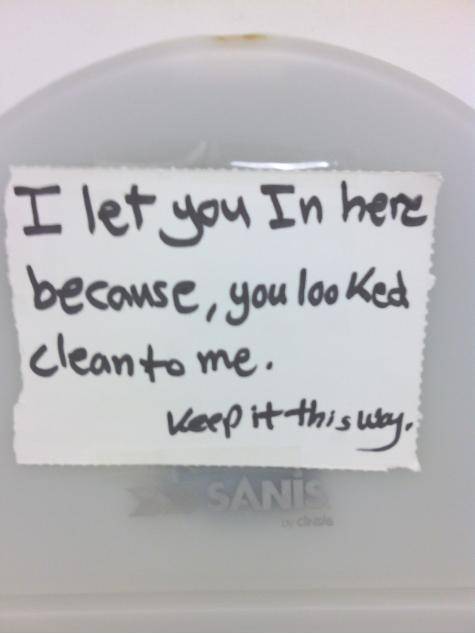 The bathroom in this truck stop said out of order, the owner said I can use it anyway.