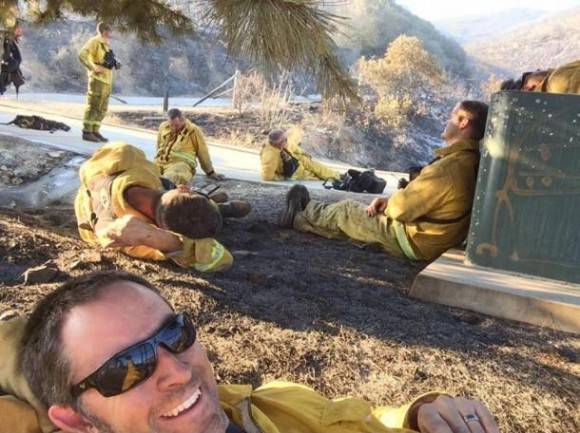 Firefighter battling the San Diego fires snaps a selfie during a well deserved rest. Thanks guys.
