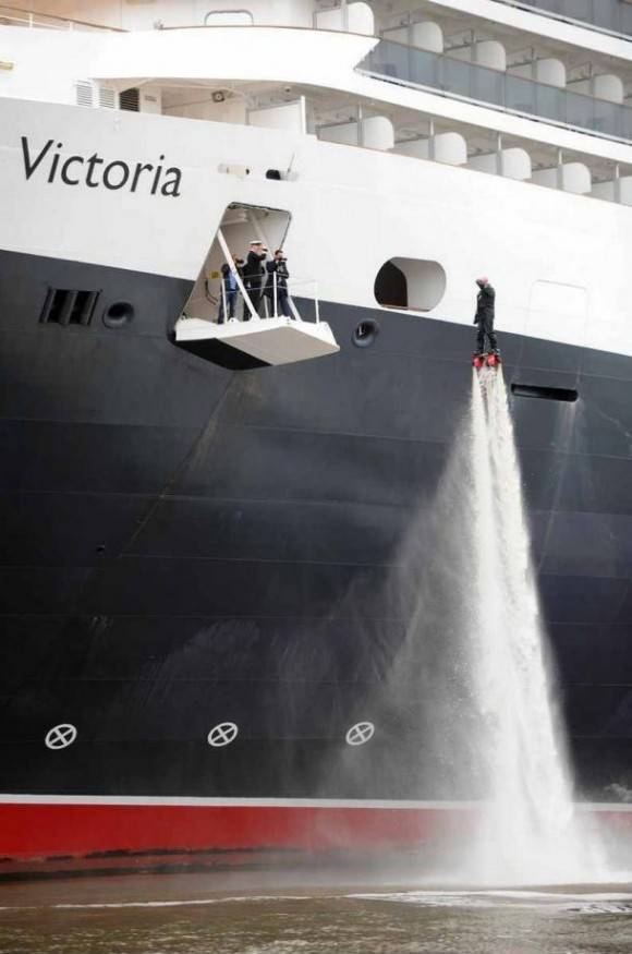 A cruise ship visited my city today. This guy was there to greet the commodore.