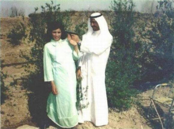 A young Saddam Hussein with his female companion. What a charmer!