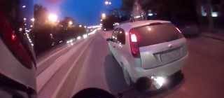 Aggressive Bikers mess with a dude in a car... Car wins.