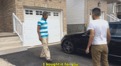 Son gets his dad a Fathers day gift.