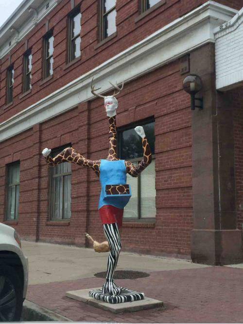 my town has this weird running statue.....
