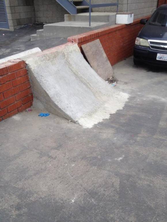 Some high school skater boys BUILT this ramp in our parking lot overnight and had the audacity to leave a note that said