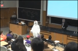 Angry professor chases student in chicken suit