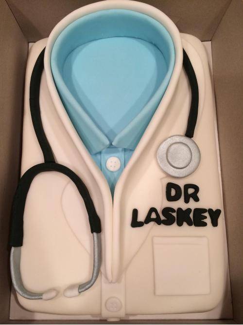 My wife made a cake for my brother becoming a doctor.