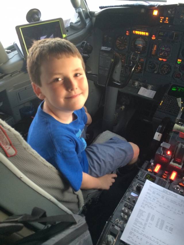 Flying from Vegas to St.Louis today, my 9 year old son asked the pilot