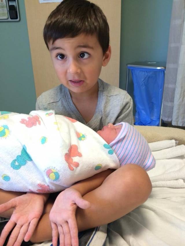My nephew holding his baby sister for the first time. As a single guy it reminded me of what it's like to hold someone's baby.