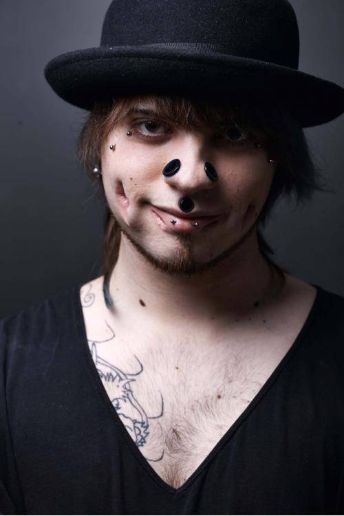 Apparently when you take those cheek piercings out, the ones that show your teeth, you just look like you have a big, gaping anus in your cheek.