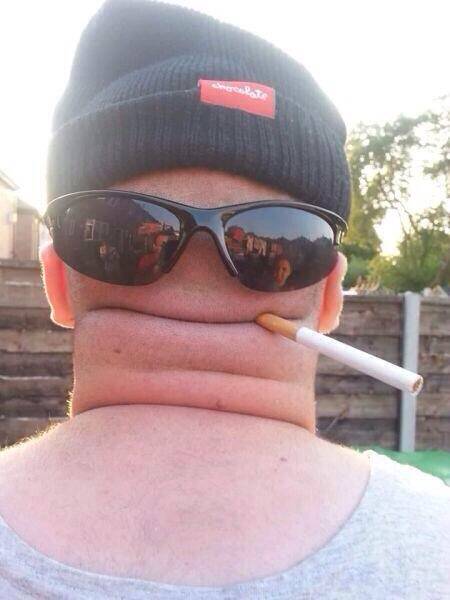 Possibly the most creative use of a hat, sunglasses, a cigarette and the back of someone's head you'll see all day