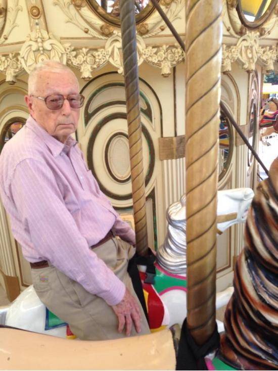 My sister somehow got my grandfather on the carousel..