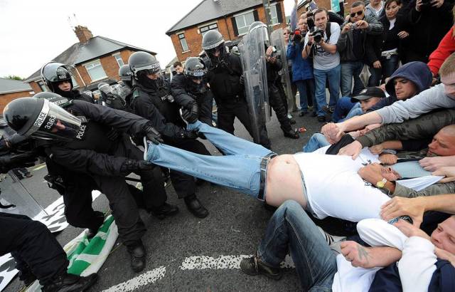 Helpful British Police Help Fat Man Out Of His Trousers