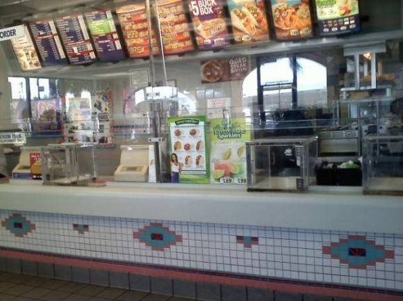Taco Bell in the hood. Yes that is bullet proof glass