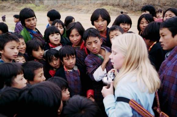 Asian children seeing a white person for the first time in a small village