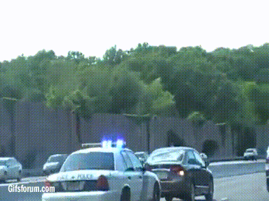 State Trooper trolling a slow driver on the highway.