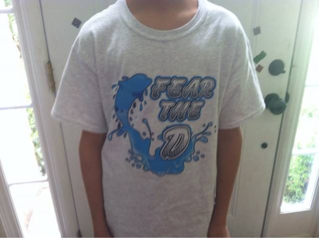 My brother's swim team shirt from this year. This had to be on purpose.