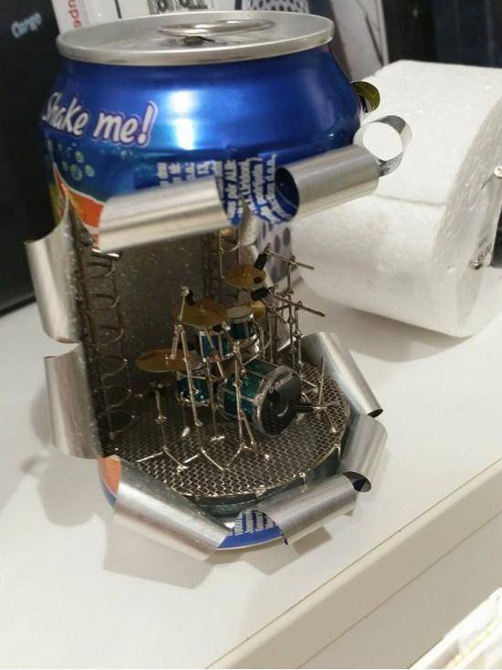 Was at a record store today, seems that some guy is making miniature drum sets in soda cans