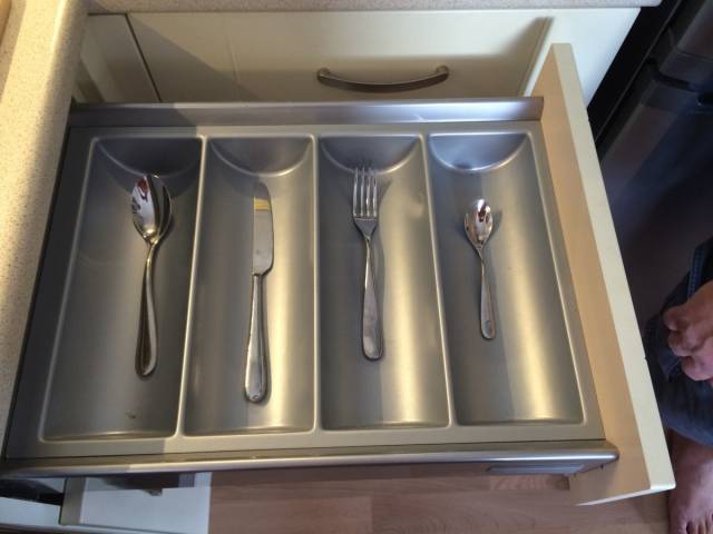My friend lives alone. His cutlery drawer.