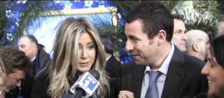 Tall Reporter scares Jennifer Aniston and Adam Sandler