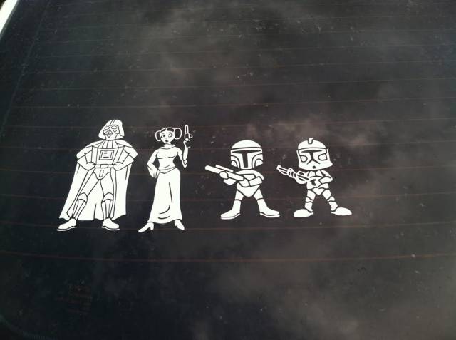 Seen on the back of a car. Star Wars fans, what's wrong with this family portrait?