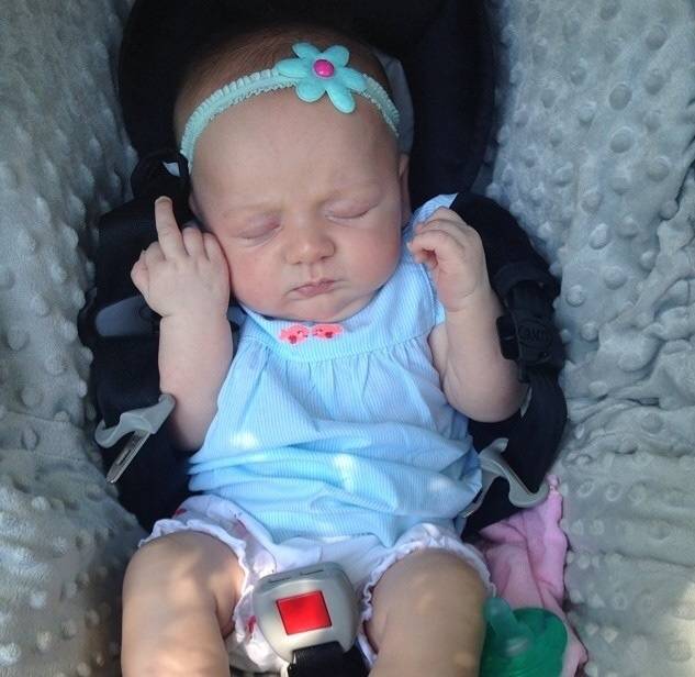 Asked our 7 week old if she was enjoying the zoo...moved her car seat cover to find this.
