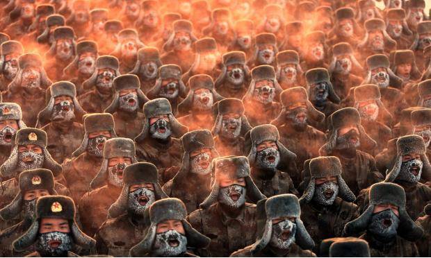 A Chinese military regiment takes part in morning exercises in sub-zero temperatures on the Sino-Russian border