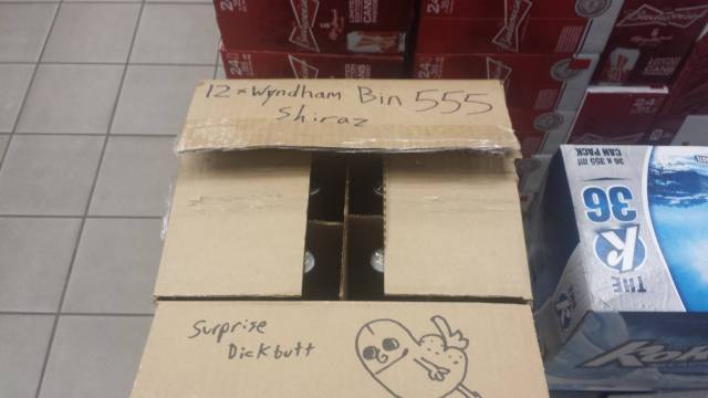 Opening a repacked box of wine at the liquor store when...