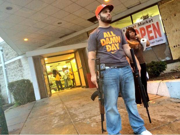 Ferguson shop owner showed up with two assault rifles after people began looting his store