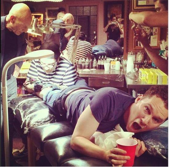 TriviaBryan Singer gets tattoo to mark Days of Future Past crossing the $700 millon mark, as Patrick Stewart looks on.