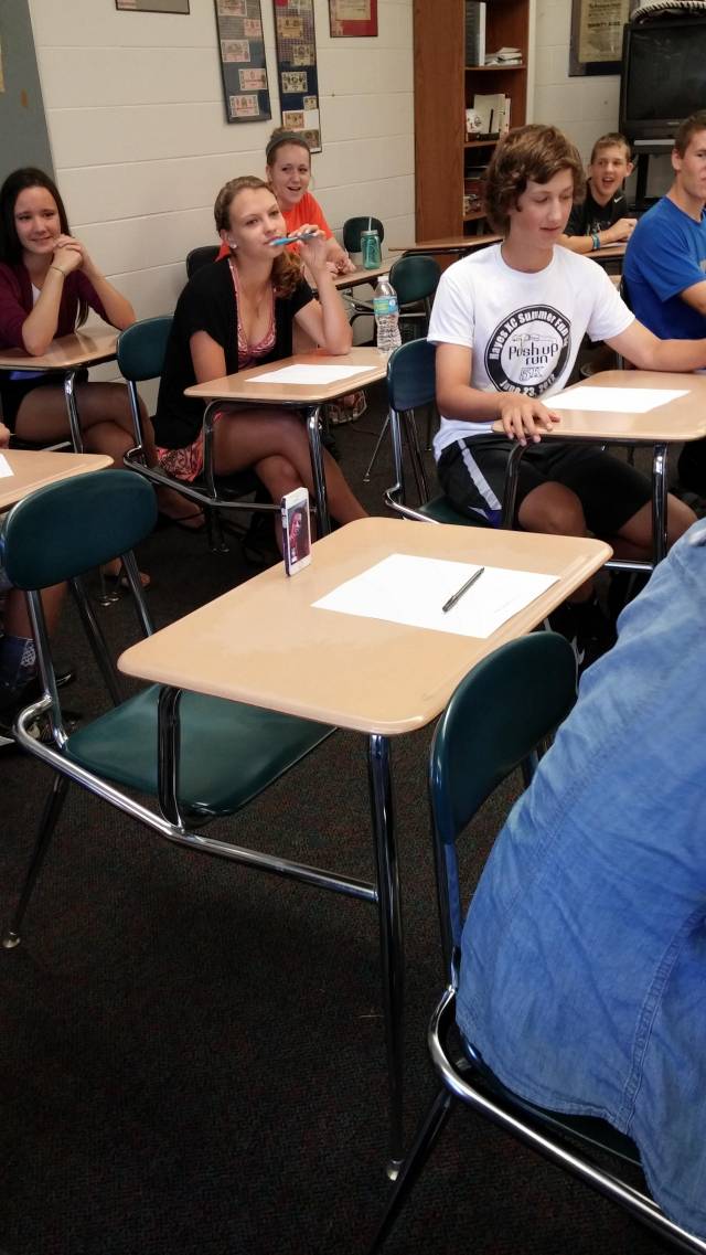 My substitute teacher had us Facetime a student that was absent, and put a test in front of them.