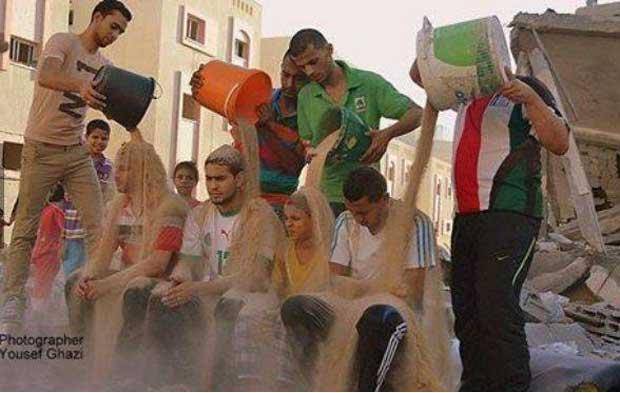 Palestinians launch #RubbleBucketChallenge to create awareness for suffering in Gaza