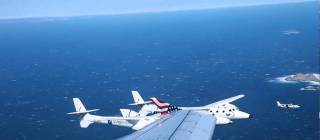 Commercial airliner is joined by Virgin Galactic’s White Knight spacecraft before landing – once in a lifetime experience for the passengers
