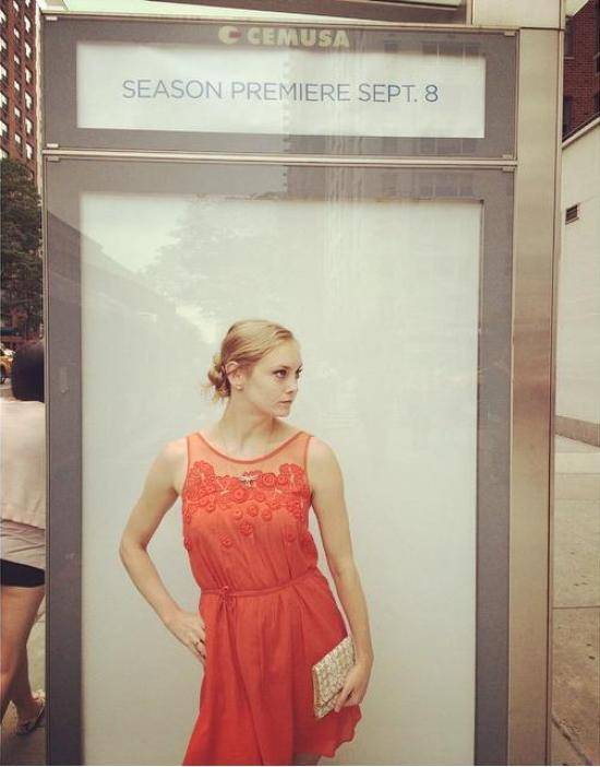 I posed in front of a blank bus stop ad. It ended up looking real.