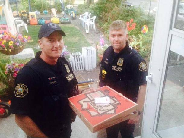 Pizza Hut driver was involved in a vehicle accident. The responding officers decided to complete his delivery for him!
