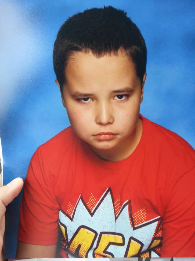 Got my son's school pictures. Such enthusiasm.