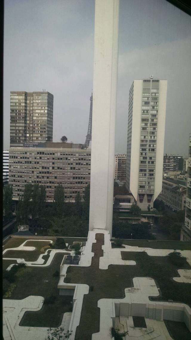 My girlfriend and I are finally on vacation in Paris after years of talking about it. We even have a view of the Eiffel Tower.