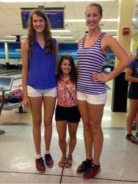 Two tallest UCF volleyball players and shortest cheerleader