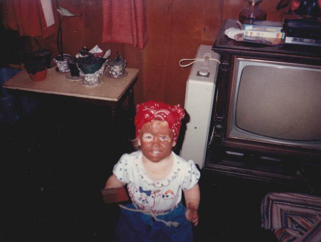 This is me dressed as Aunt Jemima for Halloween. Frugal parents and Blackface.