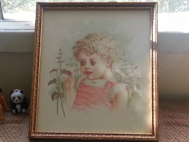 Found at an antique store, I think this little girl is on something.