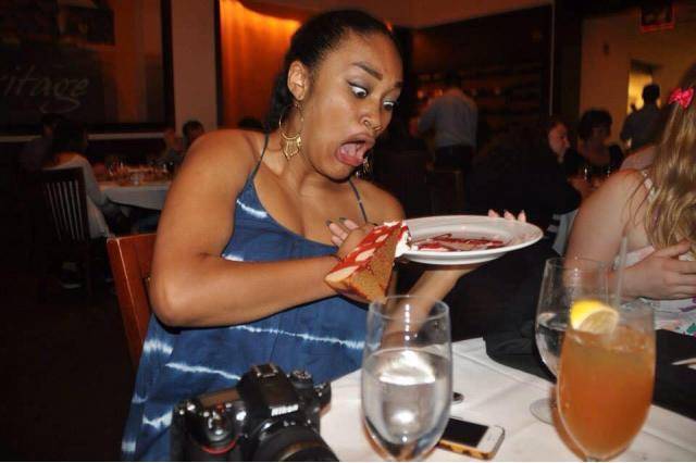 My friend wanted to take a picture with her cheesecake. She tilted the plate too much.