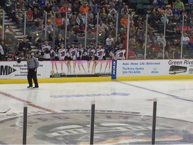 An advertisement on the opponent's bench at my local semi-pro hockey game.