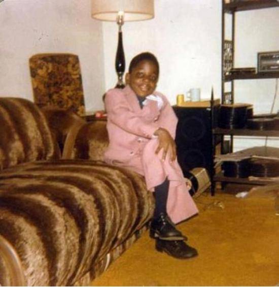 Notorious B.I.G. at 6 years old after graduating from kindergarten, around 1978