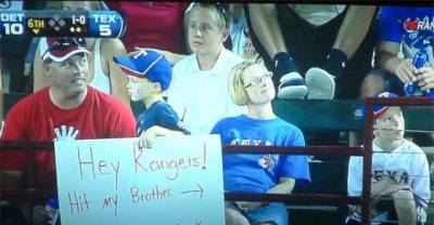 20 Creative And Hilarious Sports Spectators Holding the Funniest Sports Signs