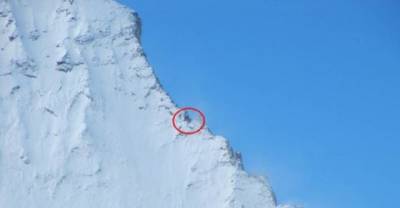 See That Tiny Spot In The Mountains? What Could It Be?