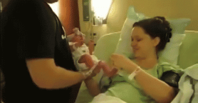Dad Hands Mom Newborn Girl. But Watch What's Written on Her Onesie. I'm in Tears!