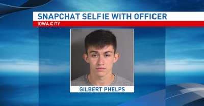 Man takes Snapchat selfie with arresting officer