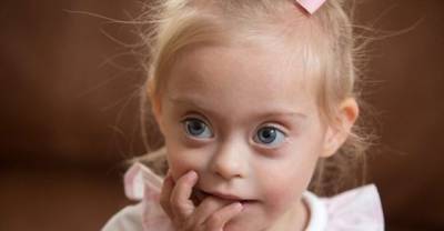 Pretty Toddler With Down's Syndrome Is To Become Child Model After Charming Agencies With Her 'Cheeky Smile'