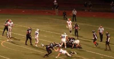 High School Football Player Hits Another Player In The Head With His Own Helmet!