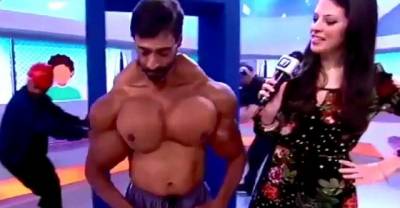 Portuguese Bodybuilder Who Was Teased For Being Thin Shows Off His Muscles On Tv But It Looks Like He May Have Taken A Less Than Safe Shortcut To Becoming A Beefcake.