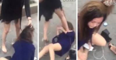 Woman Catches Husbands Side Chick In The Street. What Follows Should Be A Warning To All Side Chicks.